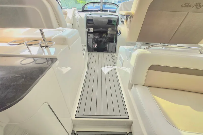 Slide: The Image of Luxurious interior of 2014 Sea Ray 470 Sundancer yacht with elegant seating and sleek design. - 15
