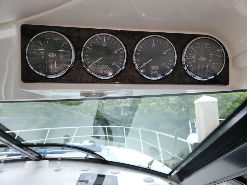 Slide: The Image of Dashboard gauges on a 2014 Sea Ray 470 Sundancer yacht, view from cockpit. - 31