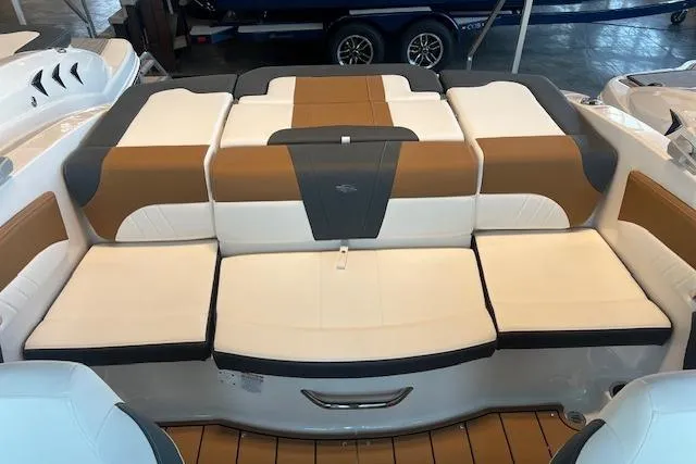 Slide: The Image of 2025 Chaparral 21 SSi boat interior with stylish cushioned seating. - 16