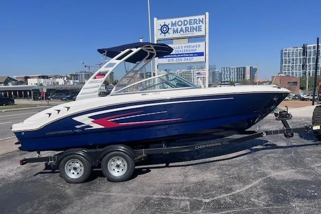Slide: The Image of 2025 Chaparral 21 SSi boat on trailer at Modern Marine dealership. - 2