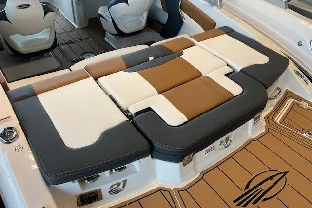 Slide: The Image of 2025 Chaparral 21 SSi boat interior with stylish seating and modern design. - 20