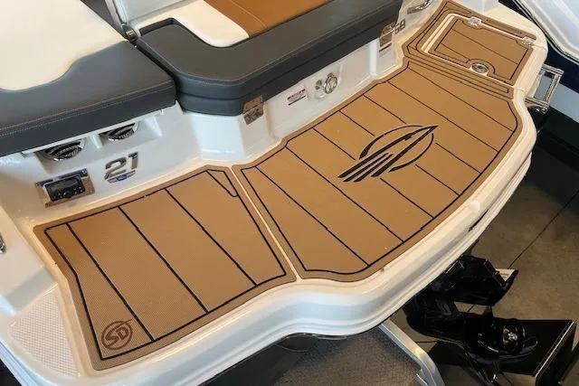 Slide: The Image of 2025 Chaparral 21 SSi boat deck with custom non-slip flooring and logo design. - 24