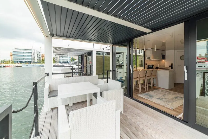 Slide: The Image of Modern Waterlodge 11 houseboat with stylish interior and waterfront view, 2026 model. - 37