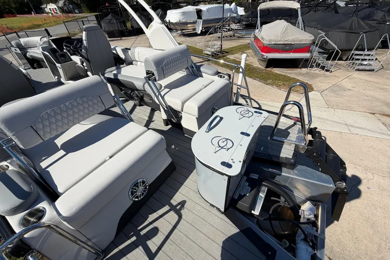 Slide: The Image of 2026 Avalon Excalibur 27' boat interior with luxurious seating and modern amenities. - 6