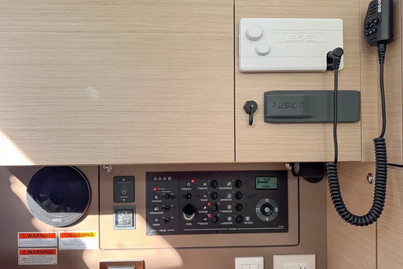 Slide: The Image of Control panel of 2023 Beneteau Oceanis 38.1 yacht with B&G and Fusion systems. - 9