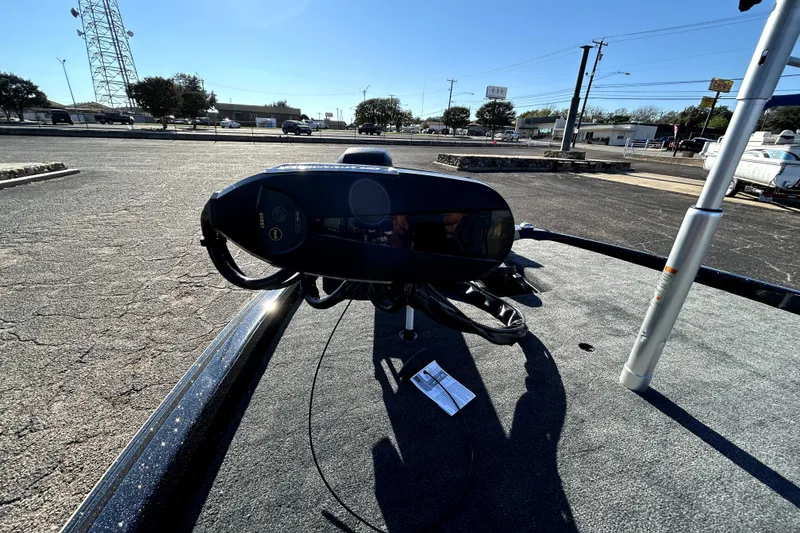 Slide: The Image of 2026 Skeeter ZXE21 boat deck with advanced control panel in a parking lot. - 8
