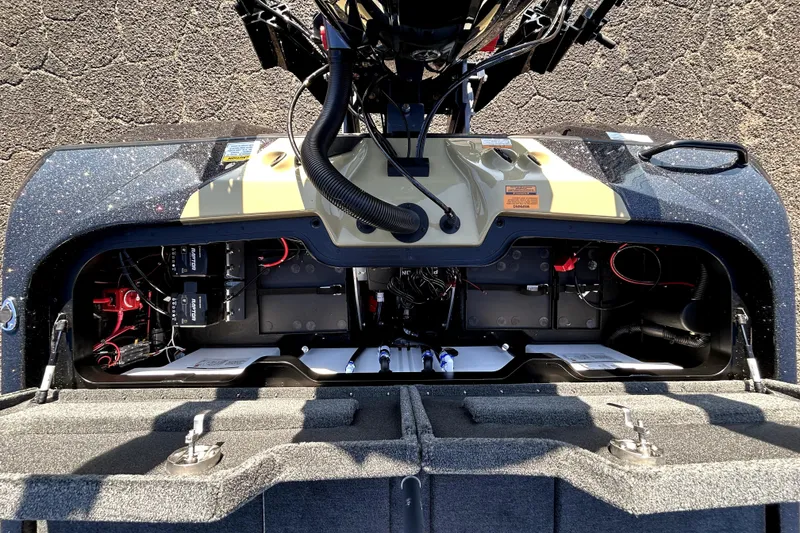 Slide: The Image of 2026 Skeeter ZXE21 boat interior showing battery compartment and wiring setup. - 36