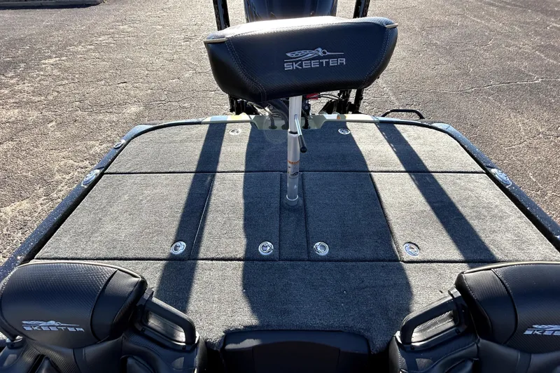 Slide: The Image of 2026 Skeeter ZXE21 boat deck with seating and storage compartments. - 28