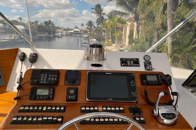Slide: The Image of Cockpit view of 1989 Hatteras 70 Cockpit Motor Yacht with navigation equipment. - 15