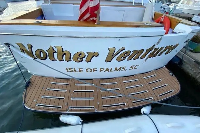 Slide: The Image of Stern view of 1989 Hatteras 70 Cockpit Motor Yacht, "Nother Venture," docked at Isle of Palms. - 26
