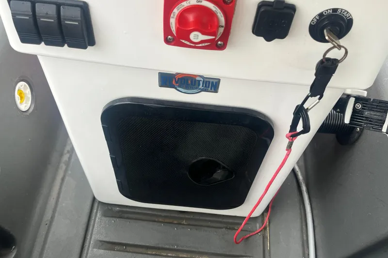 Slide: The Image of Control panel of a 2021 Whaly 435 R boat with ignition and switches. - 6