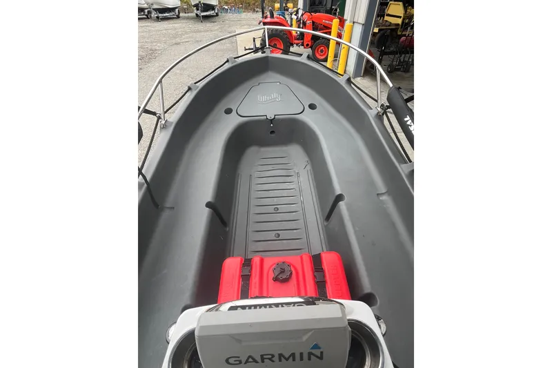 Slide: The Image of 2021 Whaly 435 R boat interior with Garmin equipment, showcasing spacious design and durable construction. - 7