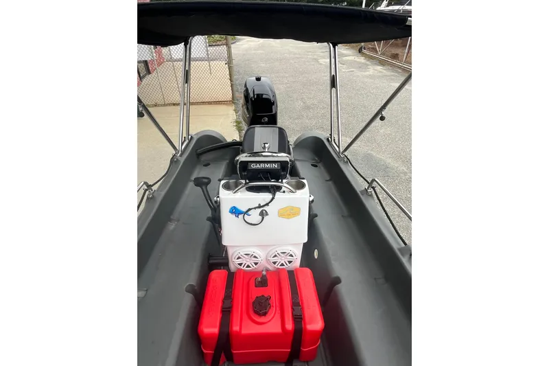 Slide: The Image of 2021 Whaly 435 R boat interior with Garmin equipment and red fuel tank. - 8