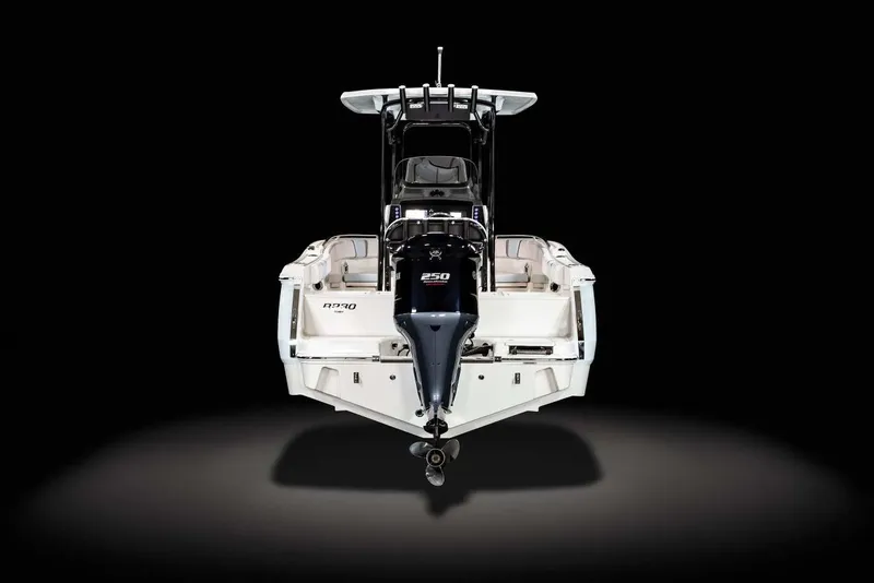 Slide: The Image of Manufacturer Provided Image: 2022 Robalo R230 Center Console boat, rear view with outboard motor. - 11
