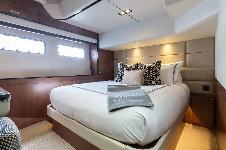 Slide: The Image of Luxurious bedroom interior of 2017 Princess 75 Motor Yacht with elegant bedding and modern design. - 15