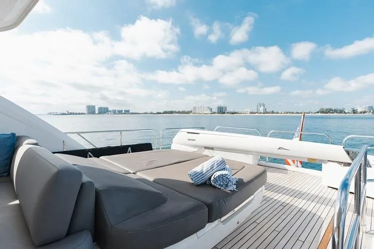 Slide: The Image of Luxurious 2017 Princess 75 Motor Yacht deck with sun loungers and ocean view. - 22