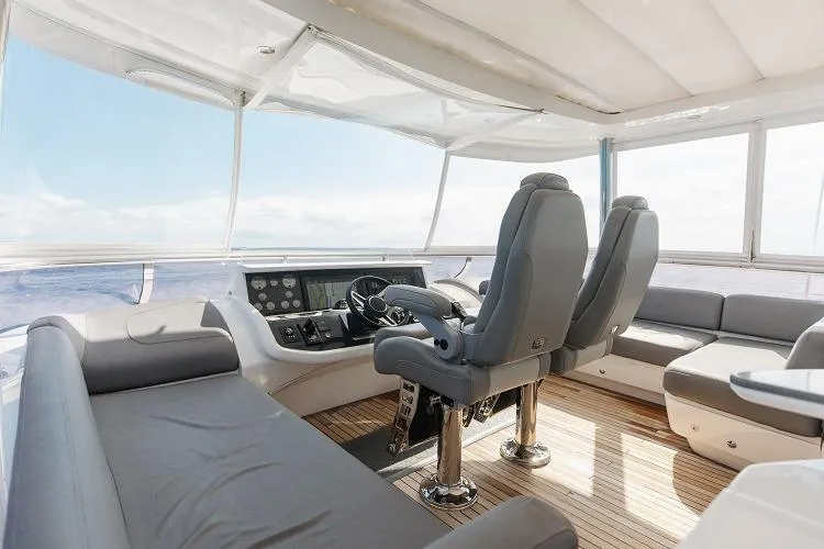 Slide: The Image of Luxurious interior of 2017 Princess 75 Motor Yacht with modern helm and seating. - 23