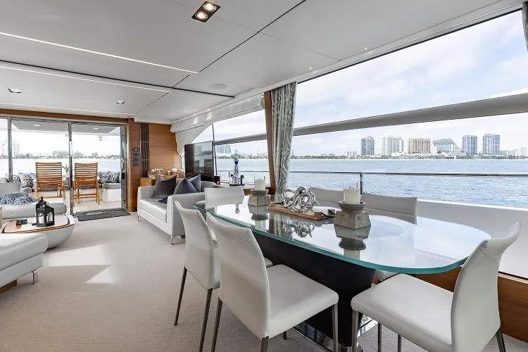 Slide: The Image of Luxurious interior of 2017 Princess 75 Motor Yacht with elegant dining area and scenic views. - 5