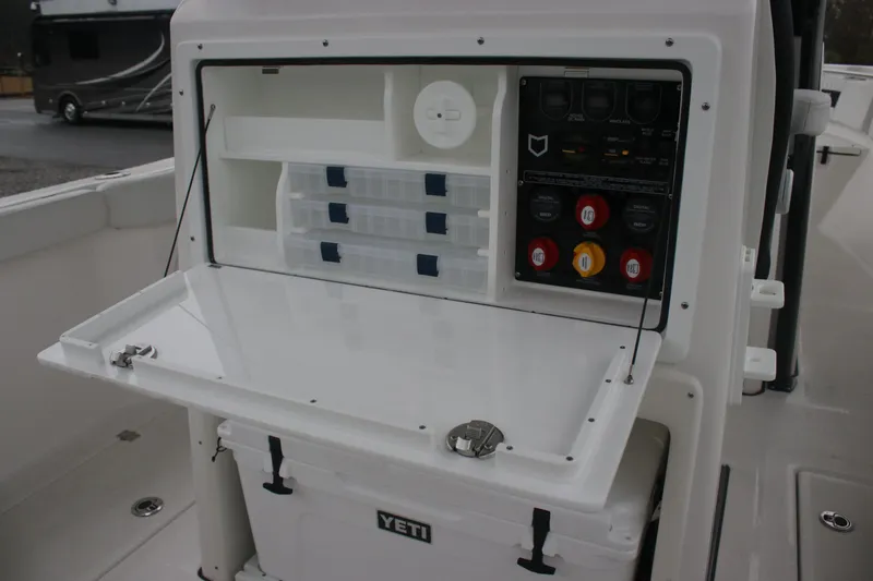 Slide: The Image of 2026 Sea Fox 288 Commander boat console with storage and control panel. - 10