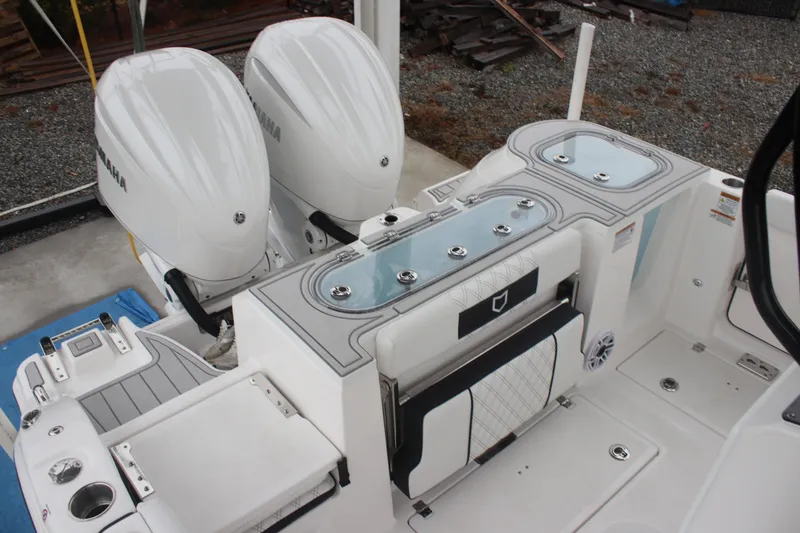 Slide: The Image of 2026 Sea Fox 288 Commander boat with dual Yamaha engines and sleek deck design. - 13