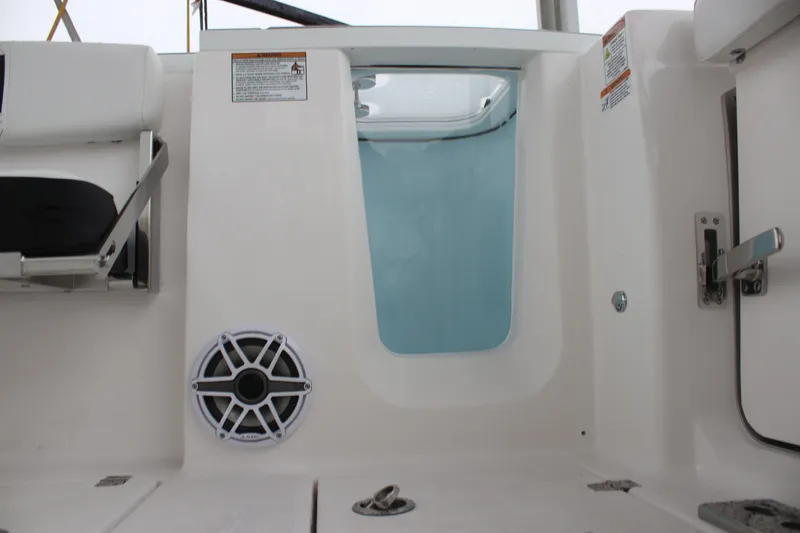 Slide: The Image of 2026 Sea Fox 288 Commander interior with speaker and seating detail. - 19