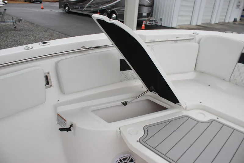 Slide: The Image of 2026 Sea Fox 288 Commander boat with open storage compartment and seating area. - 21