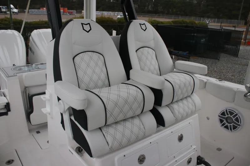 Slide: The Image of Luxurious seating on 2026 Sea Fox 288 Commander boat, featuring diamond-stitched upholstery. - 8