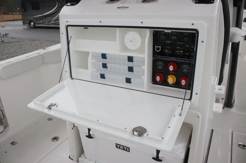 Slide: The Image of 2026 Sea Fox 288 Commander boat console with storage and control panel. - 9