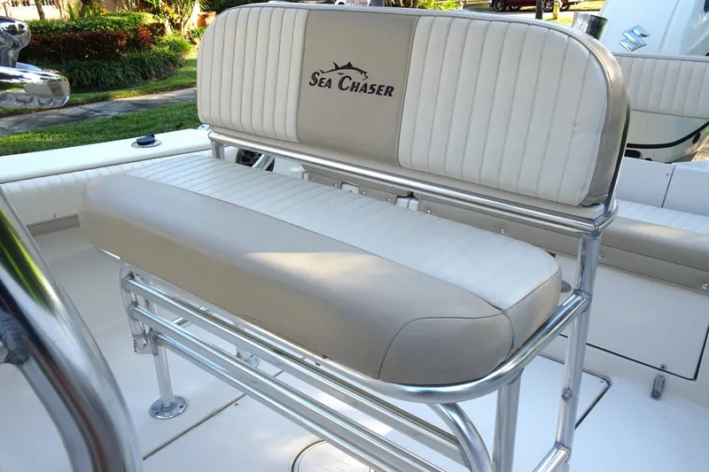 Slide: The Image of 2018 Sea Chaser 22 HFC boat seat with white and beige upholstery. - 7