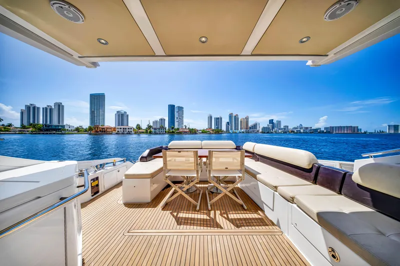 Slide: The Image of Luxurious 2016 Azimut 55S yacht deck with city skyline and waterfront view. - 24