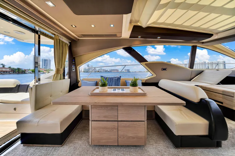 Slide: The Image of Luxurious interior of 2016 Azimut 55S yacht with elegant seating and scenic views. - 27