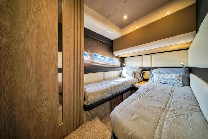 Slide: The Image of Luxurious 2016 Azimut 55S yacht cabin with twin beds and modern interior design. - 44