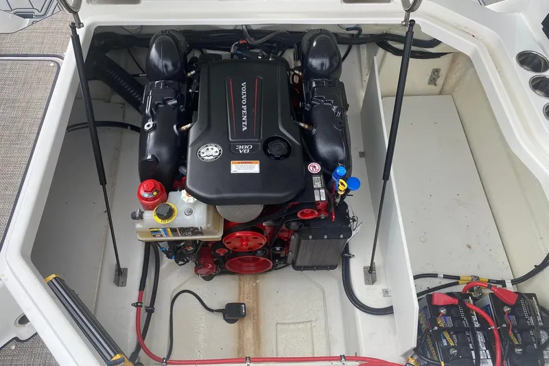 Slide: The Image of Engine compartment of a 2022 Cobalt R8 boat featuring a Volvo Penta 380 V8 engine. - 16