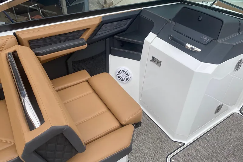 Slide: The Image of Luxurious interior of 2022 Cobalt R8 boat with tan leather seating and modern design. - 9