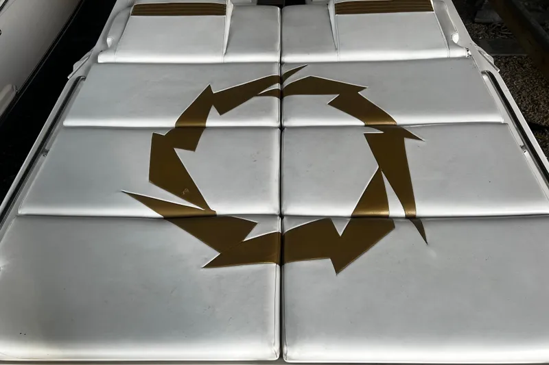 Slide: The Image of 2009 Fountain 42 Executioner boat upholstery with gold geometric design. - 16