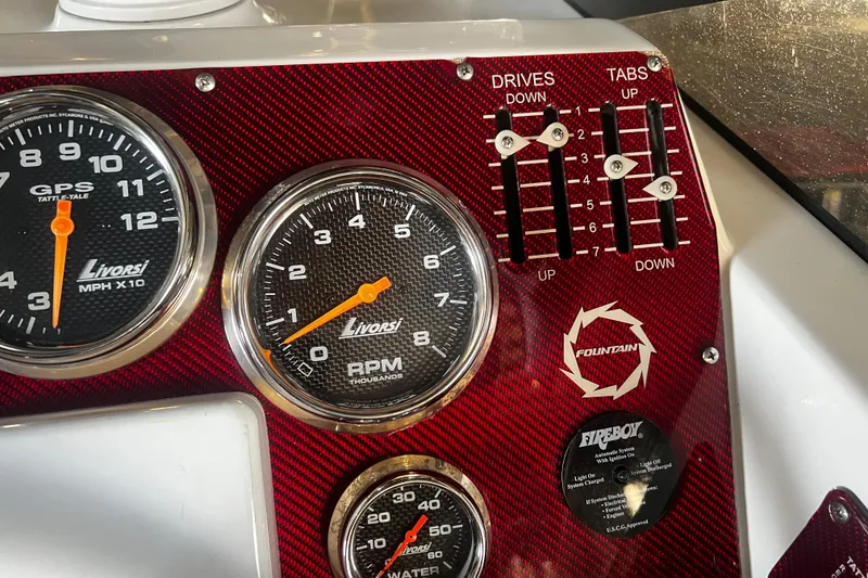 Slide: The Image of Dashboard of 2009 Fountain 42 Executioner with Livorsi gauges and controls. - 27