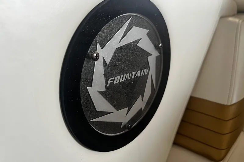 Slide: The Image of 2009 Fountain 42 Executioner logo on white and tan boat interior. - 66
