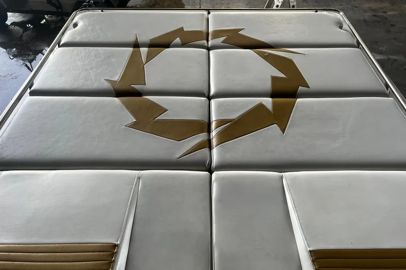 Slide: The Image of 2009 Fountain 42 Executioner boat upholstery with gold arrow design. - 67