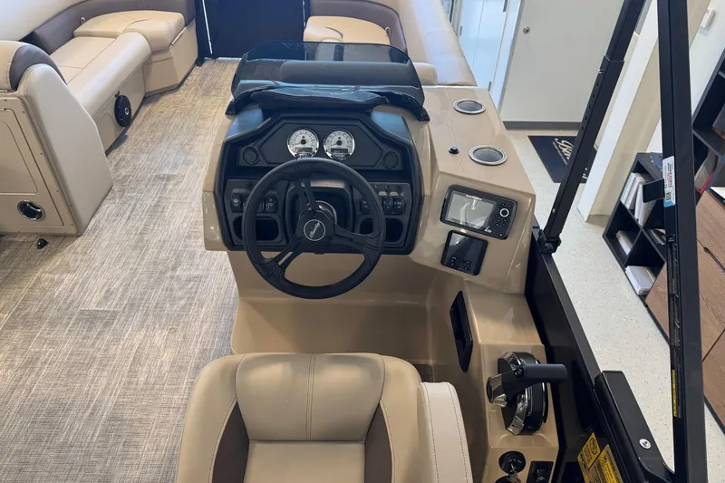 Slide: The Image of 2026 Bentley Pontoons Legacy 243 Swingback interior with steering console and seating. - 5