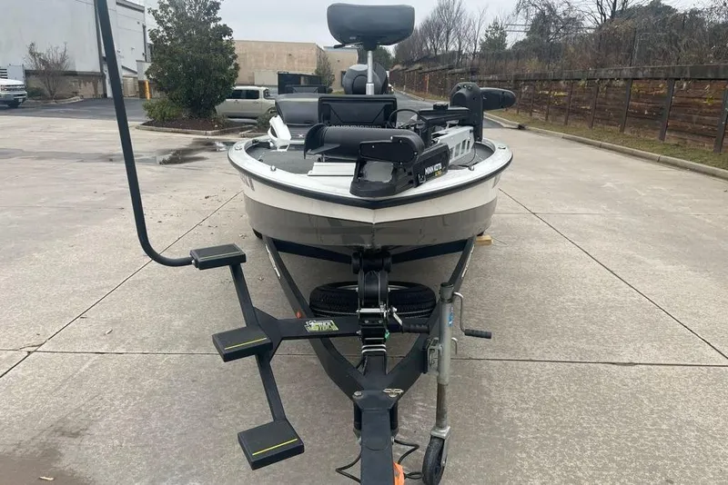 Slide: The Image of 2022 Vexus AVX2080 boat on trailer in parking lot. - 2