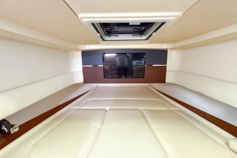 Slide: The Image of 2022 Grady-White Canyon 456 helm with Garmin displays and luxurious interior. - 28