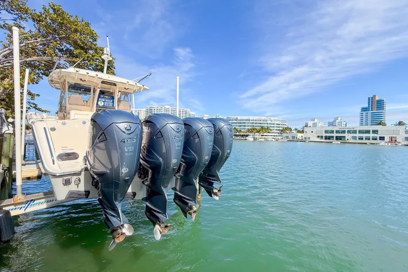 Slide: The Image of Luxurious interior cabin of 2022 Grady-White Canyon 456 with TV and plush seating. - 34