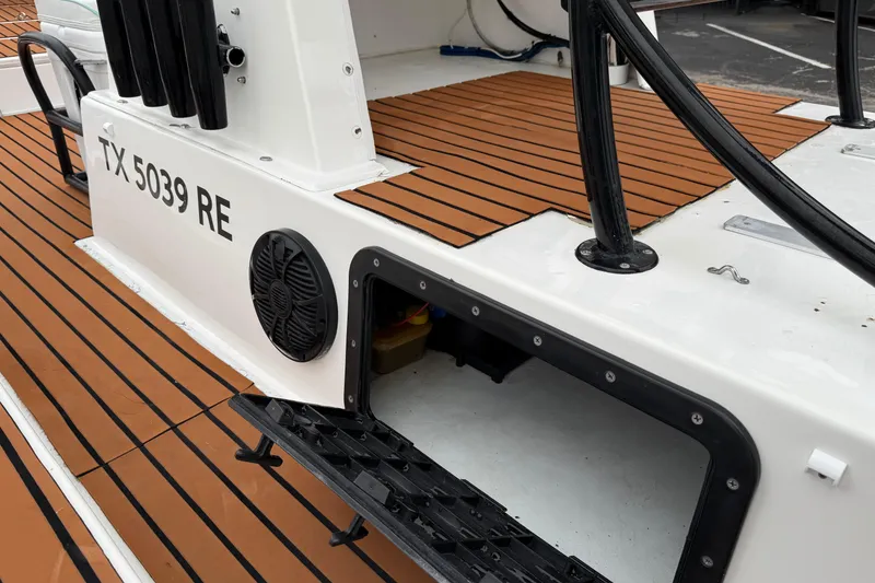 Slide: The Image of 2017 Shallow Sport 24 Sport boat with teak deck and storage compartment. - 20