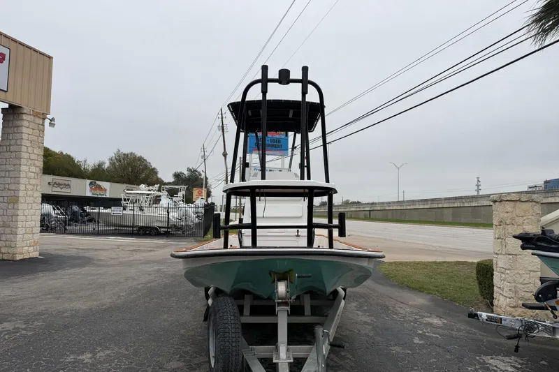 Slide: The Image of 2017 Shallow Sport 24 Sport boat on trailer at dealership. - 6