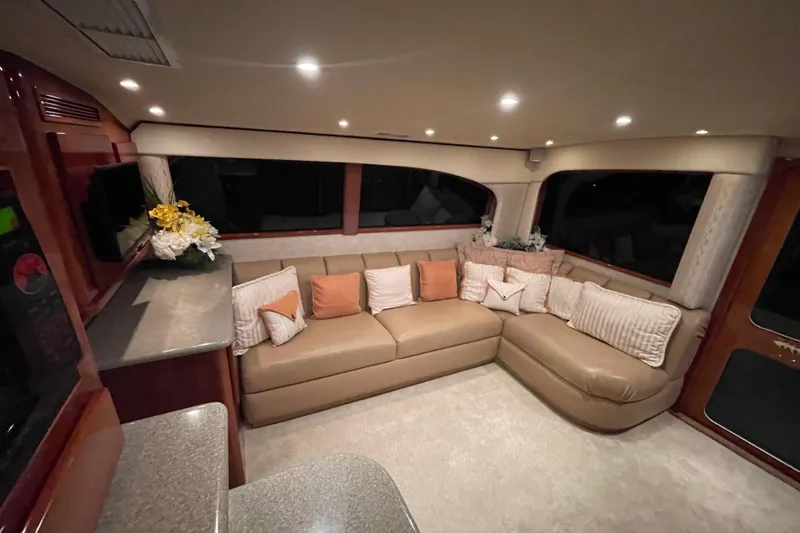 Slide: The Image of Luxurious interior of 2003 Egg Harbor 37 Sport Fisher with plush seating and elegant decor. - 40