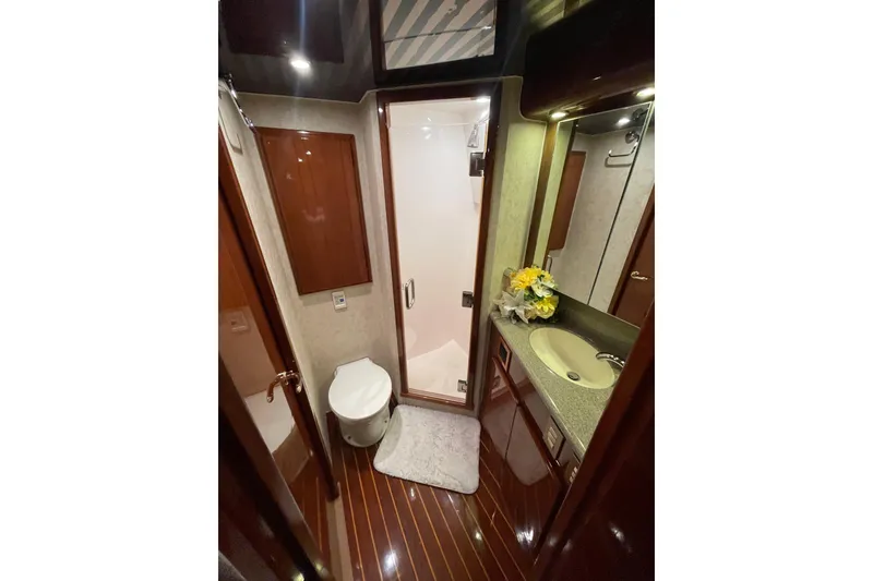 Slide: The Image of Luxurious bathroom in 2003 Egg Harbor 37 Sport Fisher yacht with modern amenities. - 45