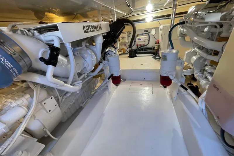 Slide: The Image of Engine room of 2003 Egg Harbor 37 Sport Fisher with Caterpillar engines. - 72