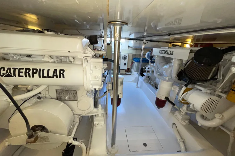 Slide: The Image of Engine room of 2003 Egg Harbor 37 Sport Fisher with Caterpillar engines. - 73