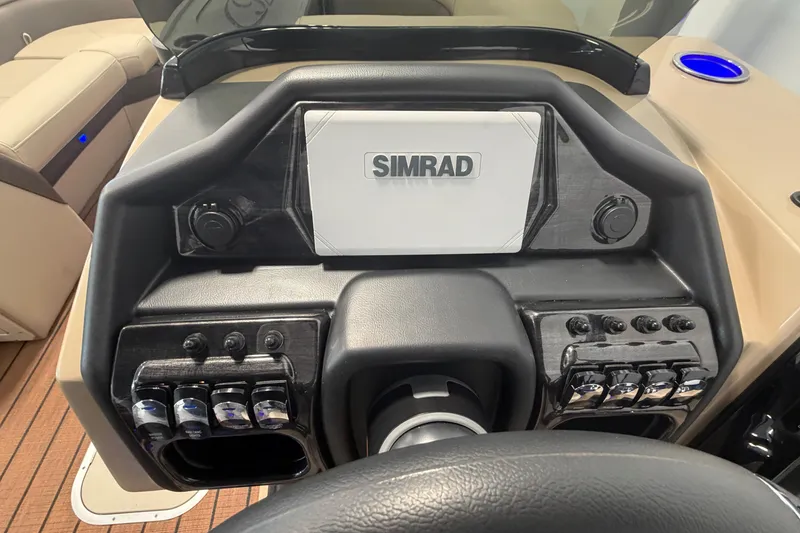 Slide: The Image of Dashboard of Bentley Pontoons Elite 223 Swingback 2026 with Simrad display. - 16