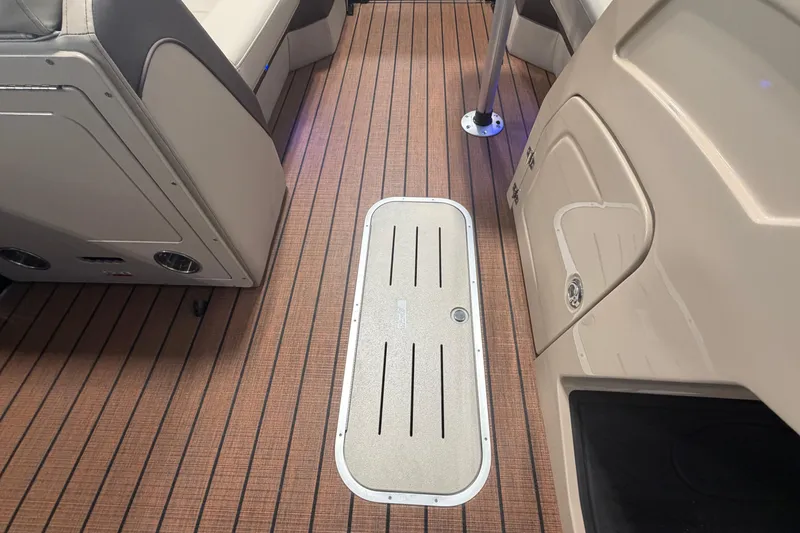 Slide: The Image of Interior of Bentley Pontoons Elite 223 Swingback 2026 with wood flooring. - 18